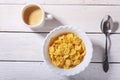 Corn Flakes cereal in a bowl and cap with espresso coffee. Morning breakfast. Royalty Free Stock Photo