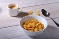 Corn Flakes cereal in a bowl and cap with espresso coffee. Morning breakfast. Royalty Free Stock Photo