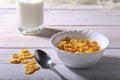 Corn Flakes cereal in a bowl and glass with milk. Morning breakfast. Royalty Free Stock Photo