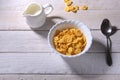 Corn Flakes cereal in a bowl and glass with milk. Morning breakfast. Royalty Free Stock Photo