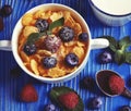 Corn Flakes with fresh berrys cereal in a bowl and glass with milk. Morning breakfast. Royalty Free Stock Photo