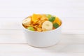 Corn flakes with milk and fresh fruit Royalty Free Stock Photo