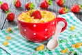 Corn flakes with milk and strawberries, close-up Royalty Free Stock Photo