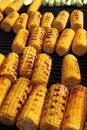Corn. Fresh organic corn cobs grilling on a barbeque. Grilled corns. Yellow baked corn cobs. Grilled corn background texture. Roas Royalty Free Stock Photo