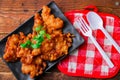 Corn Fritters With chili sauce placed on a wooden table