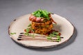 Corn fritters served with crispy bacon, avocado