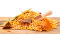 Corn grains with wooden scoop Royalty Free Stock Photo