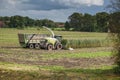 Corn harvest vehicles distant view phase 5