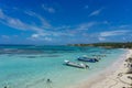 Corn Island, Nicaragua, February 24, 2018: beach view with clear skies and canoes on the shore Royalty Free Stock Photo