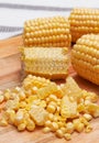 Corn kernels on the wooden board Royalty Free Stock Photo