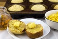 Corn muffins with butter Royalty Free Stock Photo