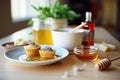 corn muffins with honey and butter Royalty Free Stock Photo