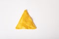 Corn nacho chips are triangular in shape on a white background. Mexican snack Royalty Free Stock Photo