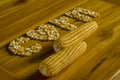 corn pods and corn kernels arranged alphabet Royalty Free Stock Photo