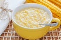 Corn porridge in yellow bowl