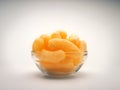 Corn Puffs in a Glass Bowl. Crunchy Flavored Puffed Snacks. Party, Movie Snacks