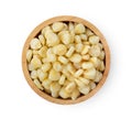 Corn seeds in wood bowl   on white background. top view Royalty Free Stock Photo