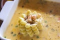 Corn and shrimp in sauce. Traditional peruvian dish Royalty Free Stock Photo