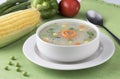 Corn soup with fresh vegetables in a bowl. Royalty Free Stock Photo