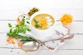 Corn soup with fresh vegetables in a bowl. Healthy food. On a black wooden background. Royalty Free Stock Photo