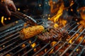 Corn and steak on the grill with visible flames and sparks. Royalty Free Stock Photo