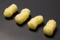 Corn sticks on a dark background Royalty Free Stock Photo