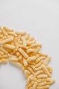 Corn sticks on a white background. Top view. Place for your text Royalty Free Stock Photo