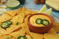 Corn tortilla chips with cheese sauce Royalty Free Stock Photo