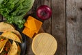 Corn tortillas for mexican tacos on rustic wooden background. Backstage of preparing traditional tasty tacos. Concept of street Royalty Free Stock Photo