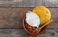 Corn tortos with picadillo and fried egg. Typical Asturian cuisine. Copy space