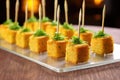 cornbread cubes on toothpicks for hors doeuvres Royalty Free Stock Photo