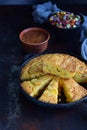 Cornbread and other mexican food - salsa with tomato, red onion, lime, cilantro, corn and hot pepper sauce. Copy space.