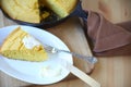 Cornbread wedge with butter Royalty Free Stock Photo