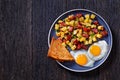 Corned Beef Hash Browns with fried eggs, top view Royalty Free Stock Photo