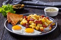 Corned Beef Hash Browns with fried eggs, top view Royalty Free Stock Photo