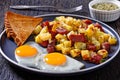 Corned Beef Hash Browns with fried eggs, top view Royalty Free Stock Photo