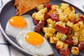 Corned Beef Hash Browns with fried eggs, top view Royalty Free Stock Photo