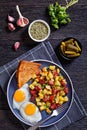 Corned Beef Hash Browns with fried eggs, top view Royalty Free Stock Photo