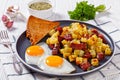 Corned Beef Hash Browns with fried eggs, top view Royalty Free Stock Photo