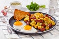 Corned Beef Hash Browns with fried eggs, top view Royalty Free Stock Photo