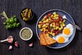 Corned Beef Hash Browns with fried eggs, top view Royalty Free Stock Photo