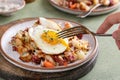 Corned beef hash with potatoes, cabbage and carrot Royalty Free Stock Photo