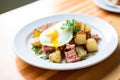 corned beef hash with sunny-side-up egg Royalty Free Stock Photo