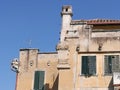 Corner of an ancient damaged building in the district Garbatella to Rome in Italy.