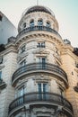 A Corner Apartment Building with Circular Round Balcony, Railings and Dome Roof Royalty Free Stock Photo