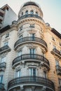 A Corner Apartment Building with Circular Round Balcony, Railings and Dome Roof Royalty Free Stock Photo