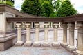 Corner of a balcony with stone railings and balustrades. Royalty Free Stock Photo