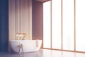 Corner of bathroom with bathtub and window. Toned Royalty Free Stock Photo