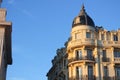Corner building of Neoclassic architecture on clear blue sky background in Paris, France