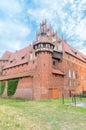 Corner of castle fortifications of the Teutonic Order in Malbork. Malbork Castle is the largest castle in the world measured by Royalty Free Stock Photo